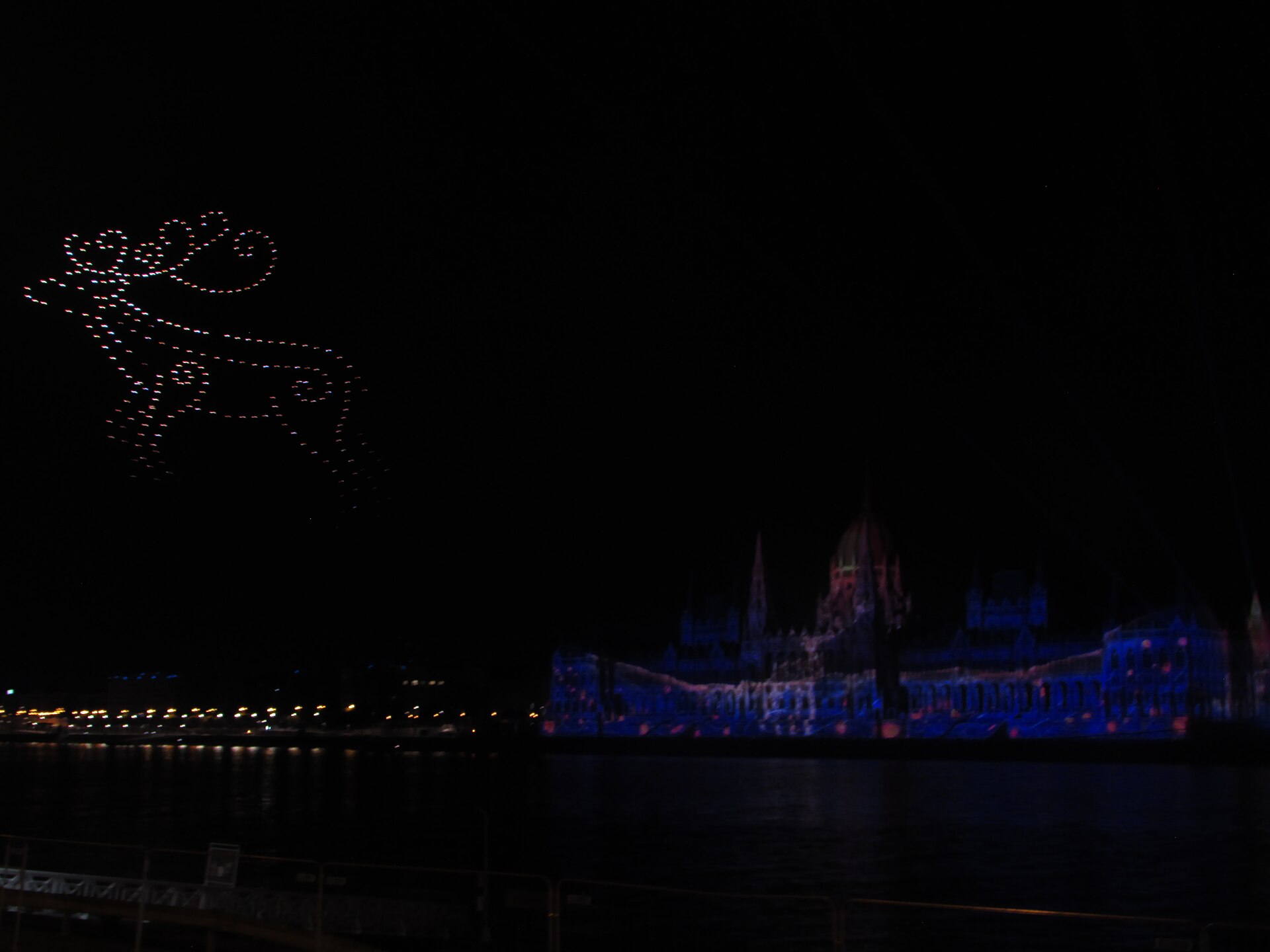 Drone show forming a complex night silhouette