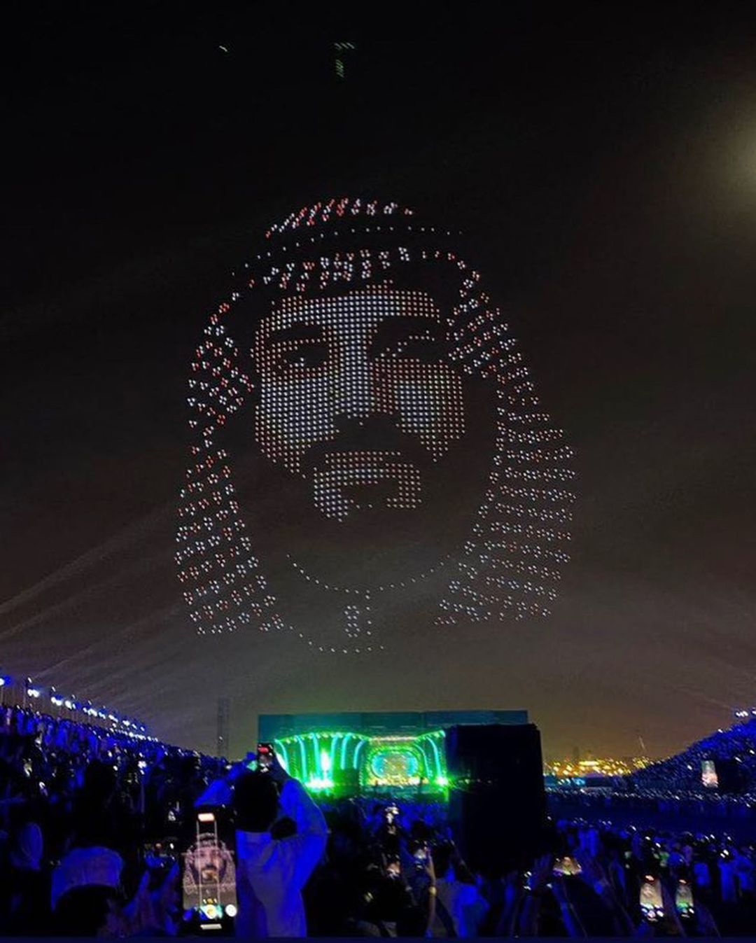 Large outdoor drone show over a city festival